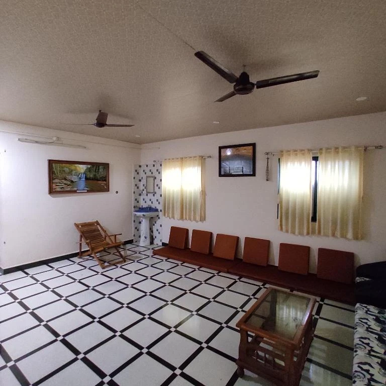 Living and seating area in the family suite at Raigad Agro Park