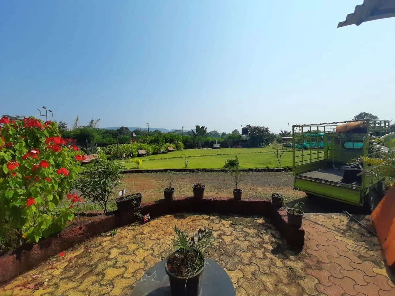 Garden seating and greenery at Raigad Agro Park