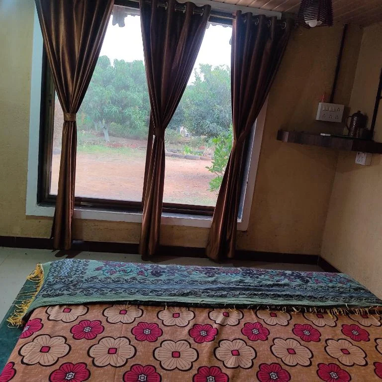 Small Double Rooms at Raigad Agro Park, photographed on the property listing